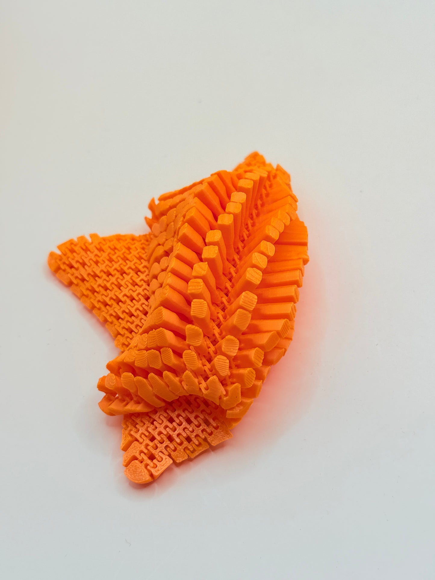3D Printed Orange Flexible Fidget Star Toy