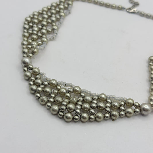 Layered Pearl-Style Bib Necklace with Soft Silver Tones