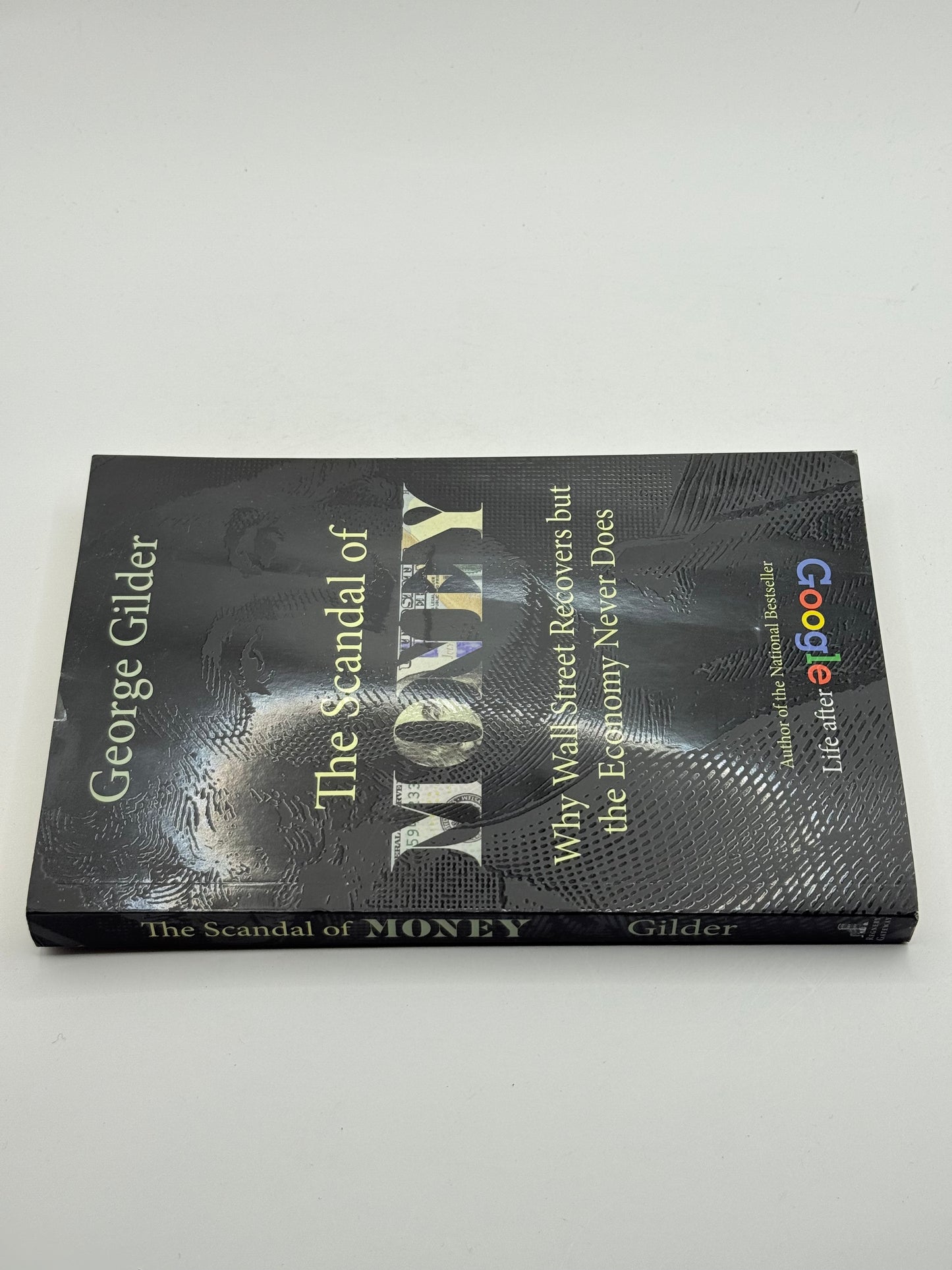 The scandal of money: why wall street recovers but the economy never does by george gilder - print books printed media