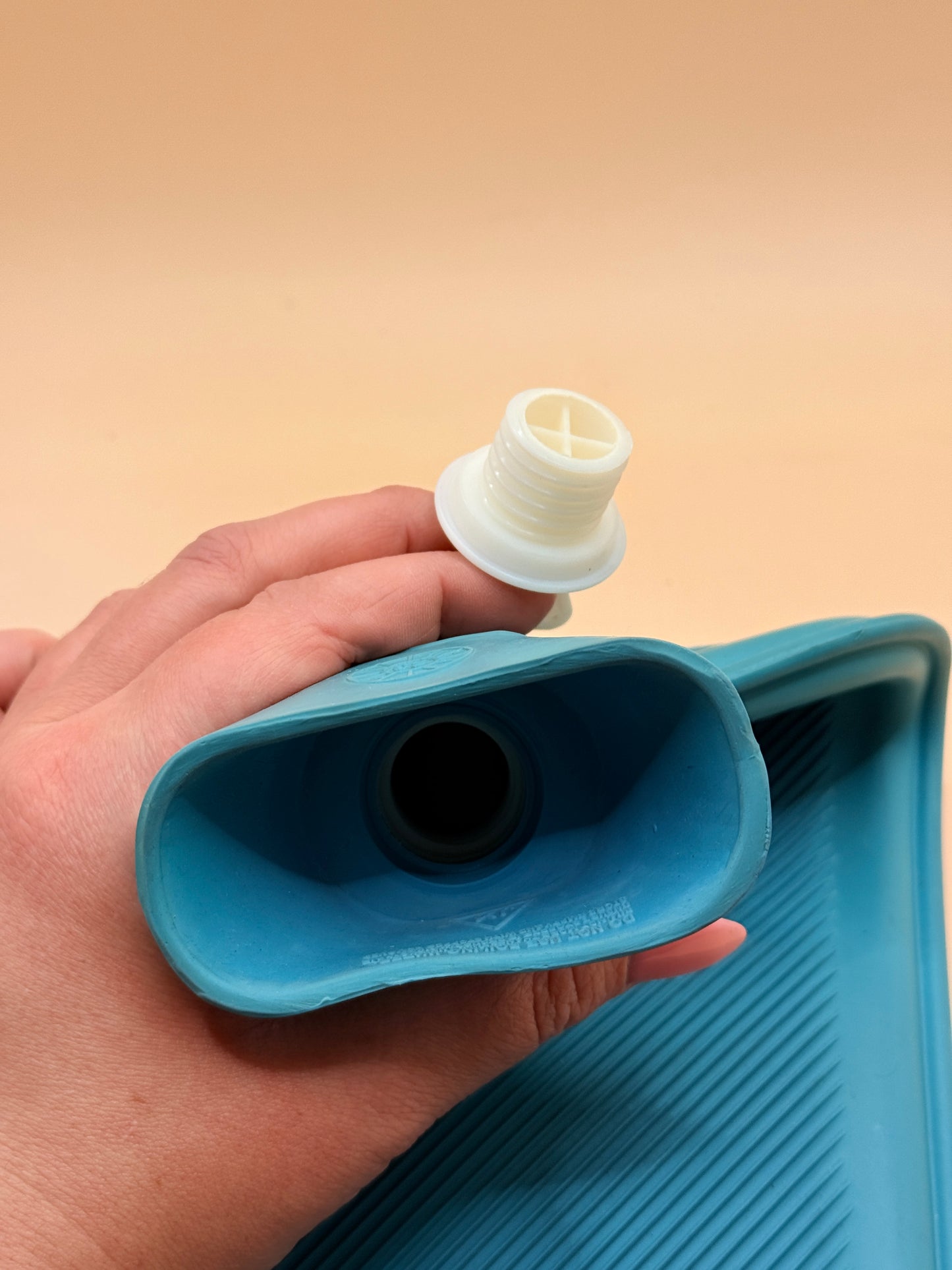 Blue rubber hot water bottle