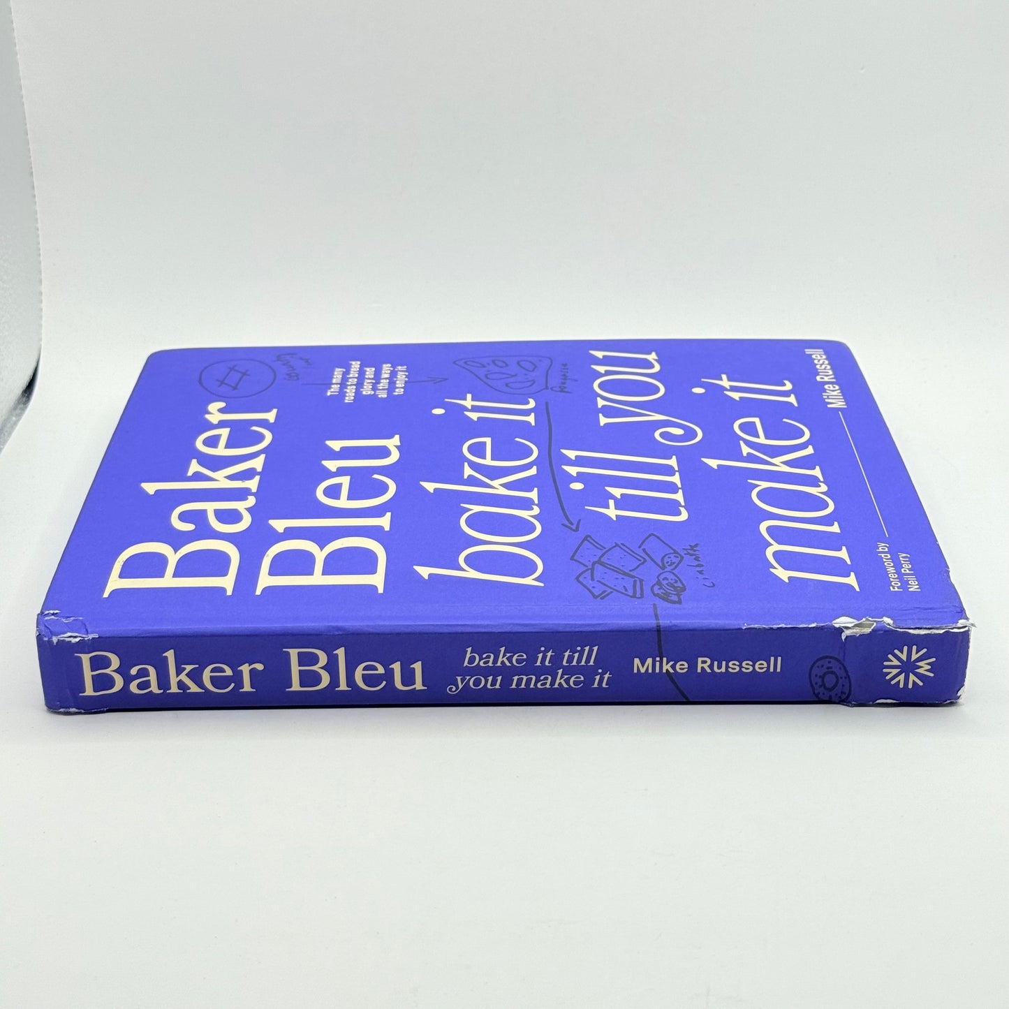 Baker bleu bake it till you make it by mike russell - print books condition: used - whatās new printed media