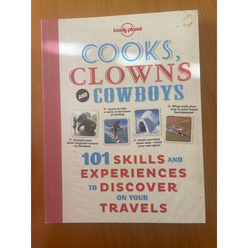 Lonely planet -cooks clowns and cowboys: 101 experiences to discover - print books book - travel printed media