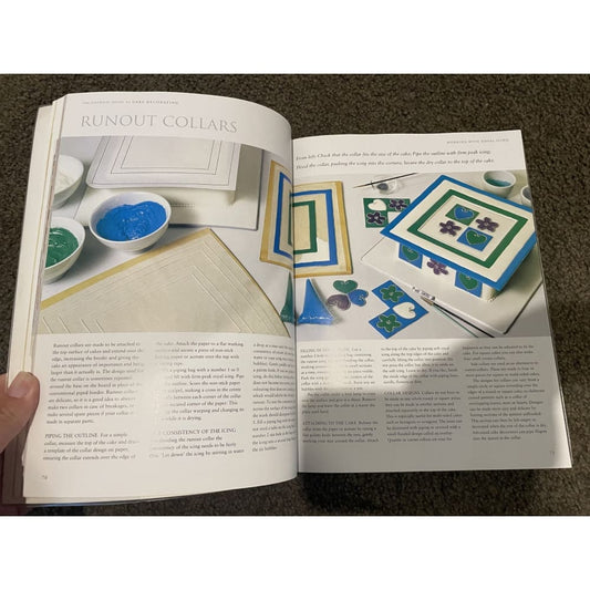 The essential guide to cake decorating - bay books - print books book - condition: used - miscellaneous printed media