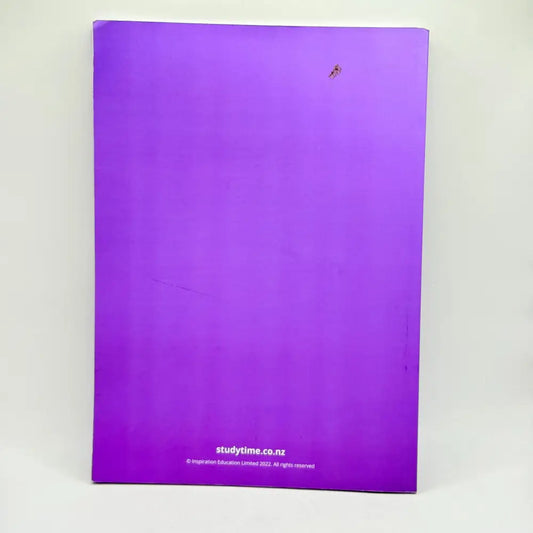 A vibrant purple notebook or binder with a slight imperfection on the top right corner.