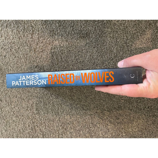Raised by wolves by james patterson & emily raymond - books printed media