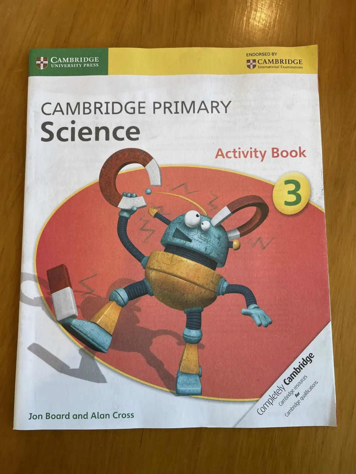 A Cambridge Primary Science Activity Book for Grade 3, authored by Jon Board and Alan Cross.