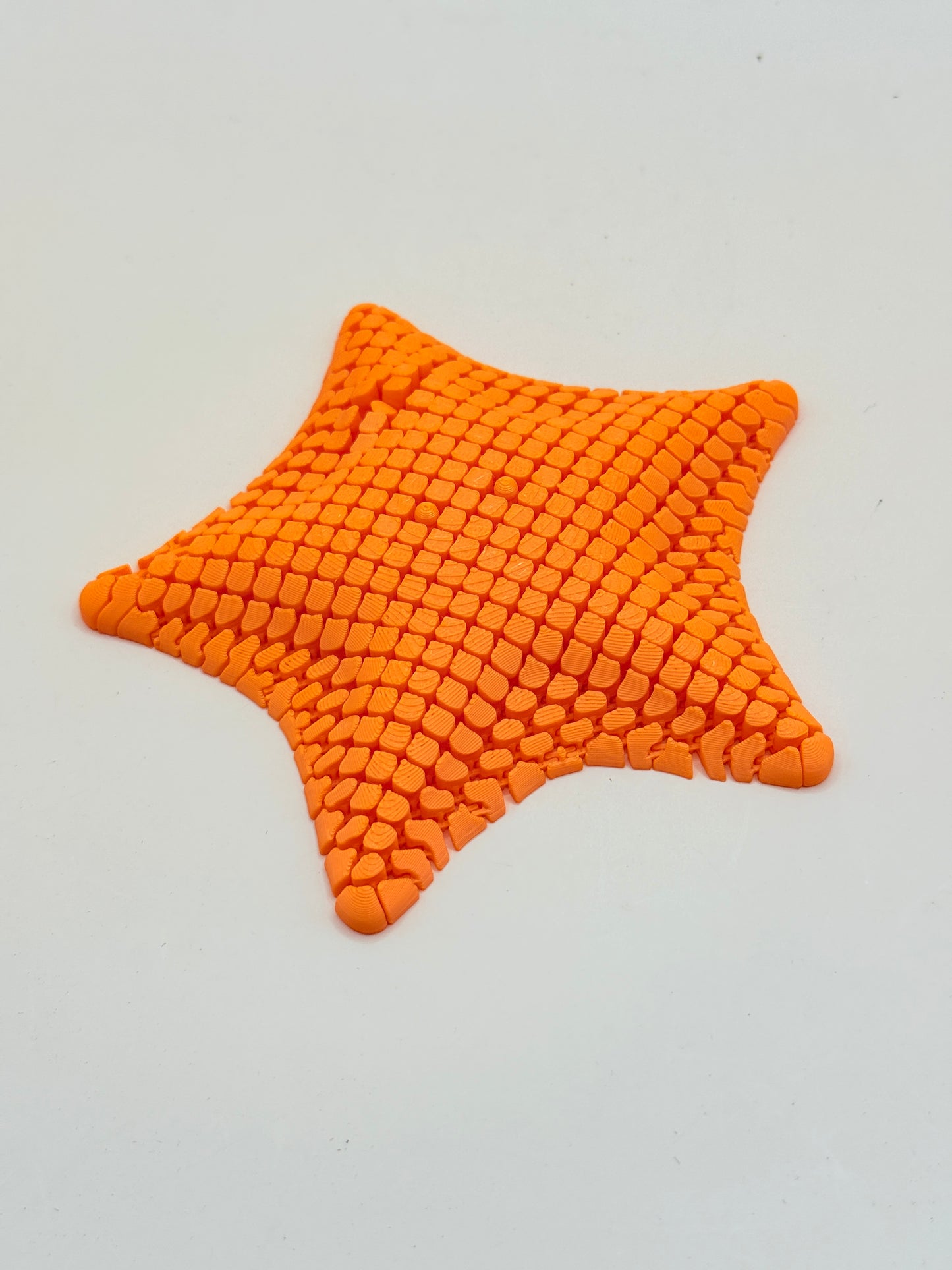 3D Printed Orange Flexible Fidget Star Toy
