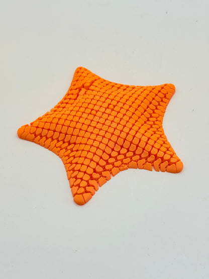 3D Printed Orange Flexible Fidget Star Toy