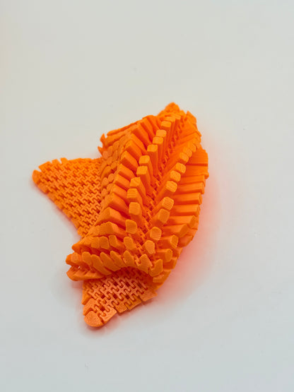 3D Printed Orange Flexible Fidget Star Toy
