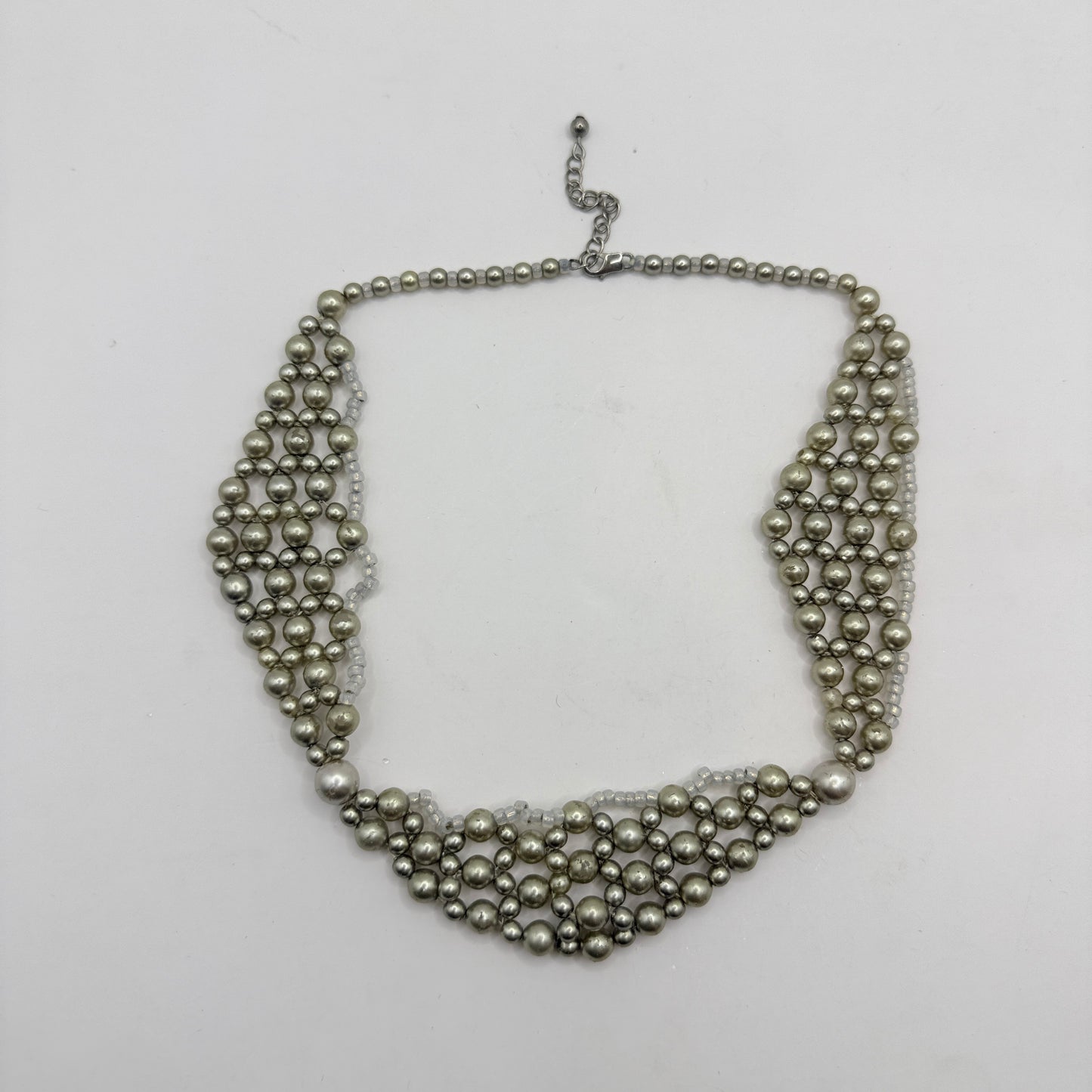 Layered Pearl-Style Bib Necklace with Soft Silver Tones