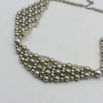 Layered Pearl-Style Bib Necklace with Soft Silver Tones