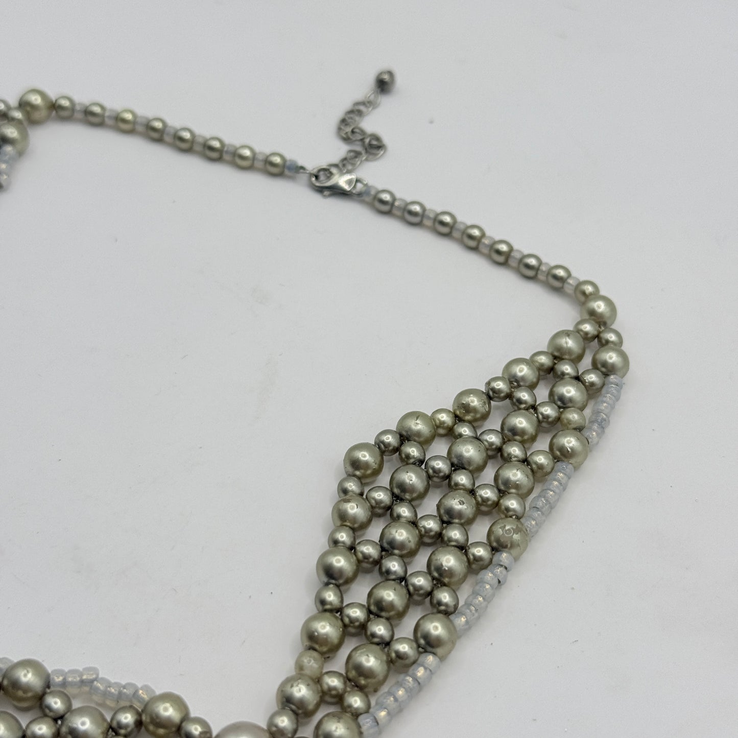 Layered Pearl-Style Bib Necklace with Soft Silver Tones