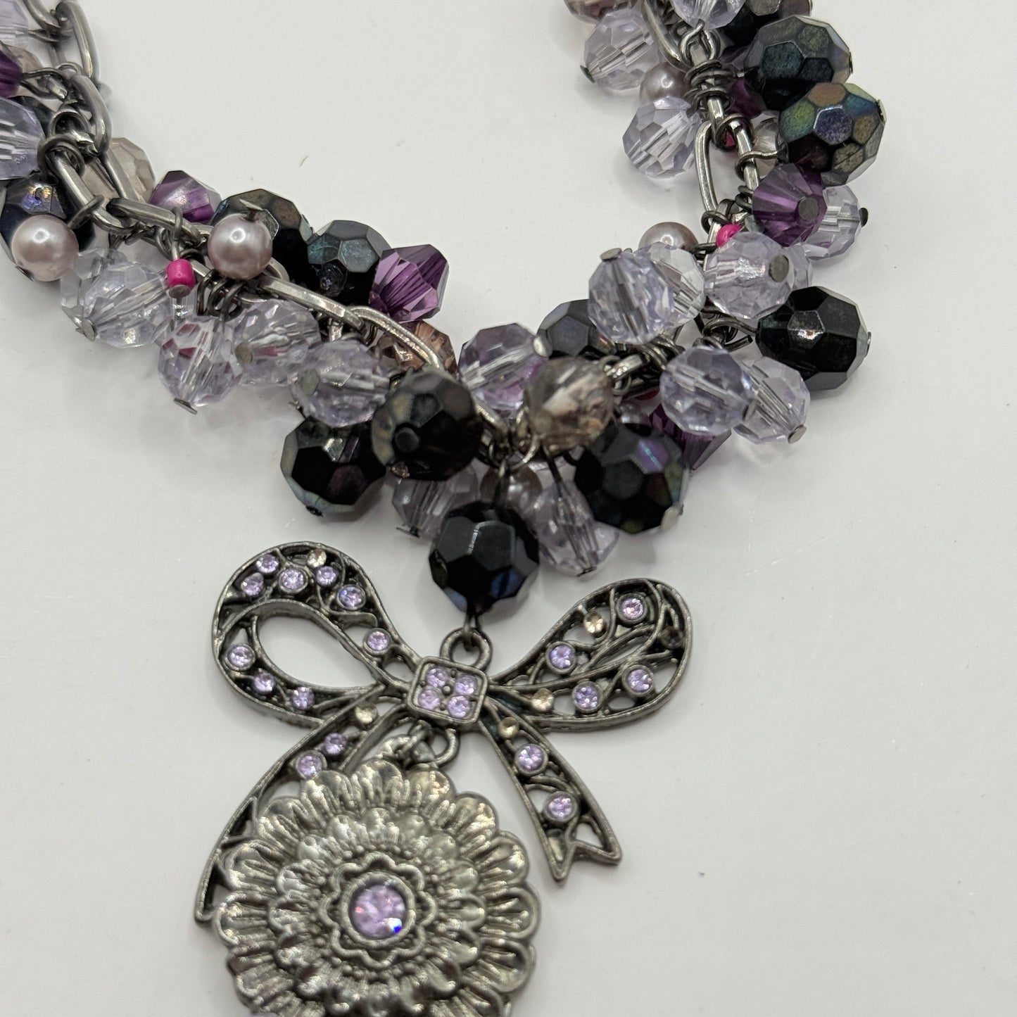 Sparkling Purple Bead Necklace with Bow & Flower Pendant