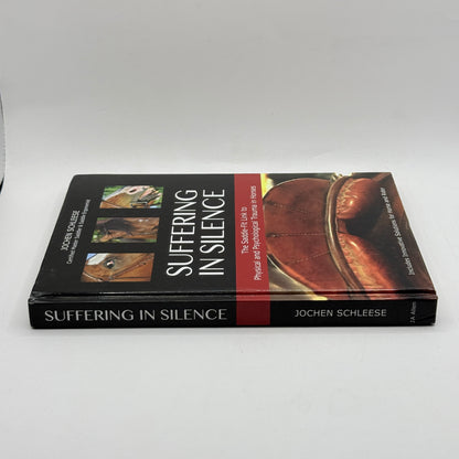 Suffering in Silence by Jochen Schleese