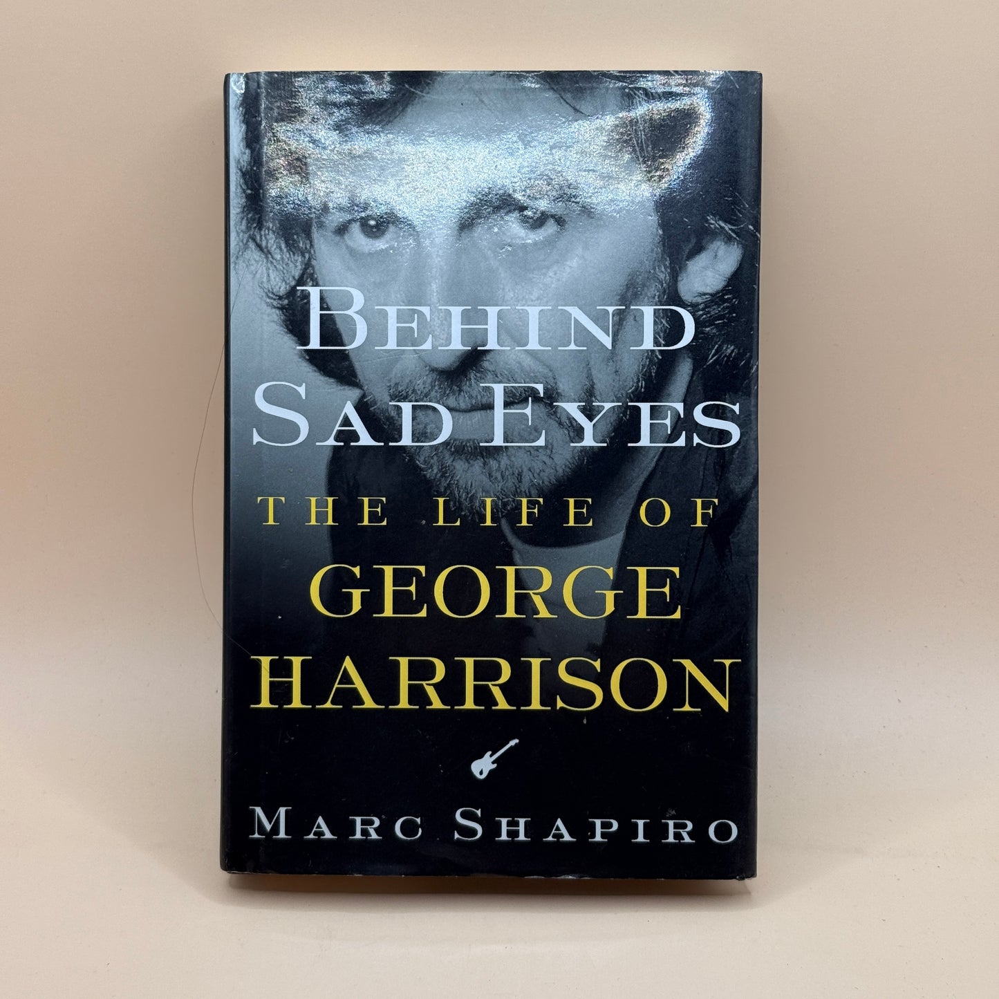 Behind Sad Eyes: The Life of George Harrison by Marc Shapiro