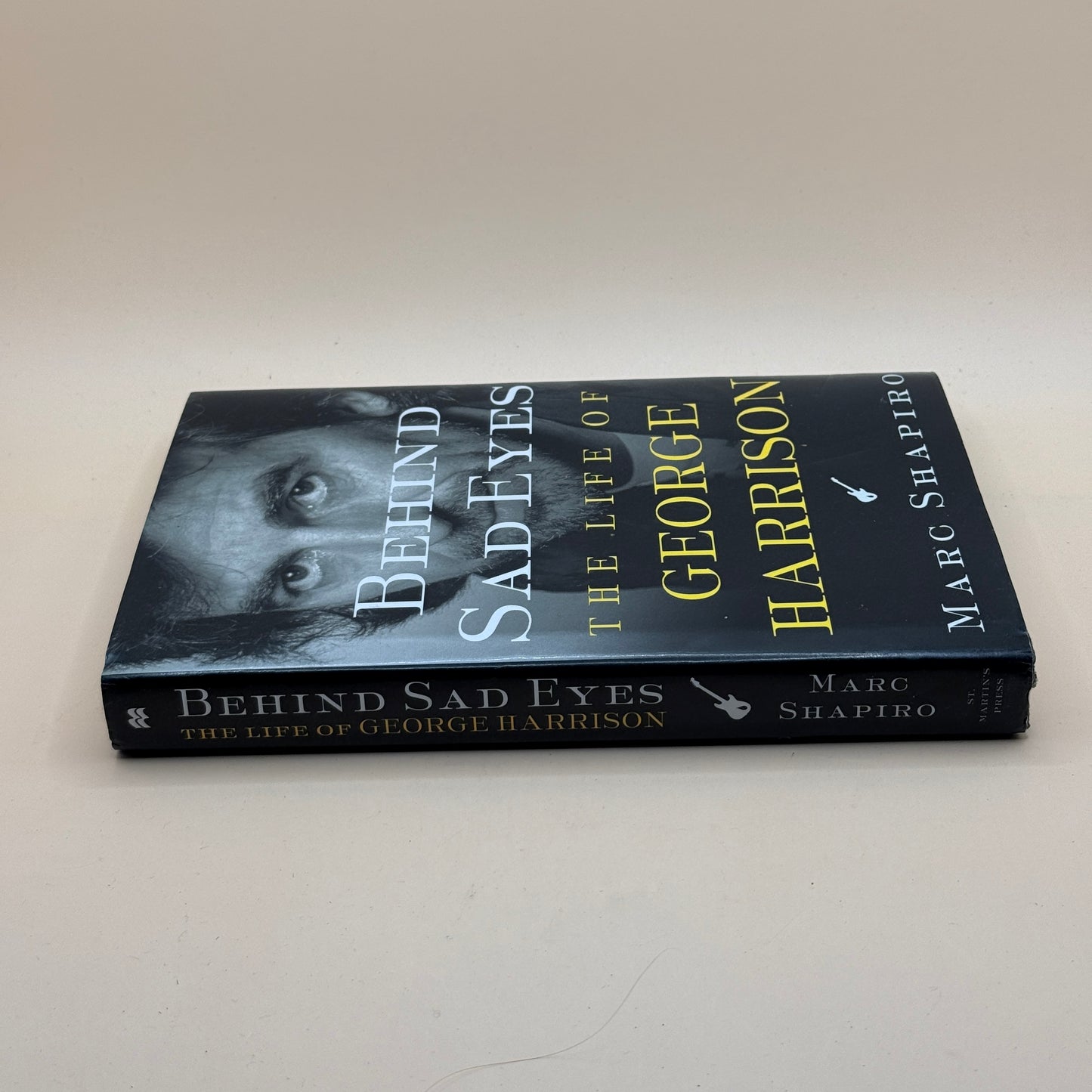 Behind Sad Eyes: The Life of George Harrison by Marc Shapiro