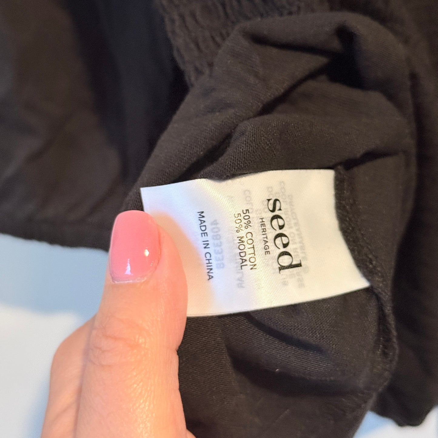 Seed Size S Black Smocked Peplum Top