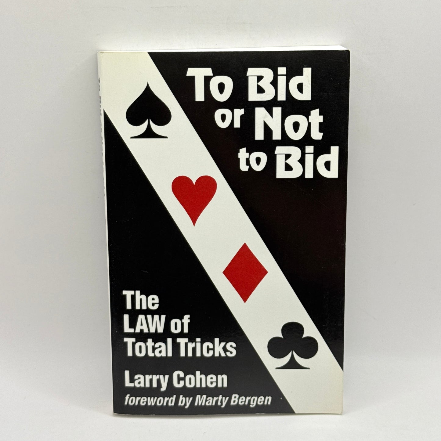 To Bid or Not to Bid: The Law of Total Tricks by Larry Cohen