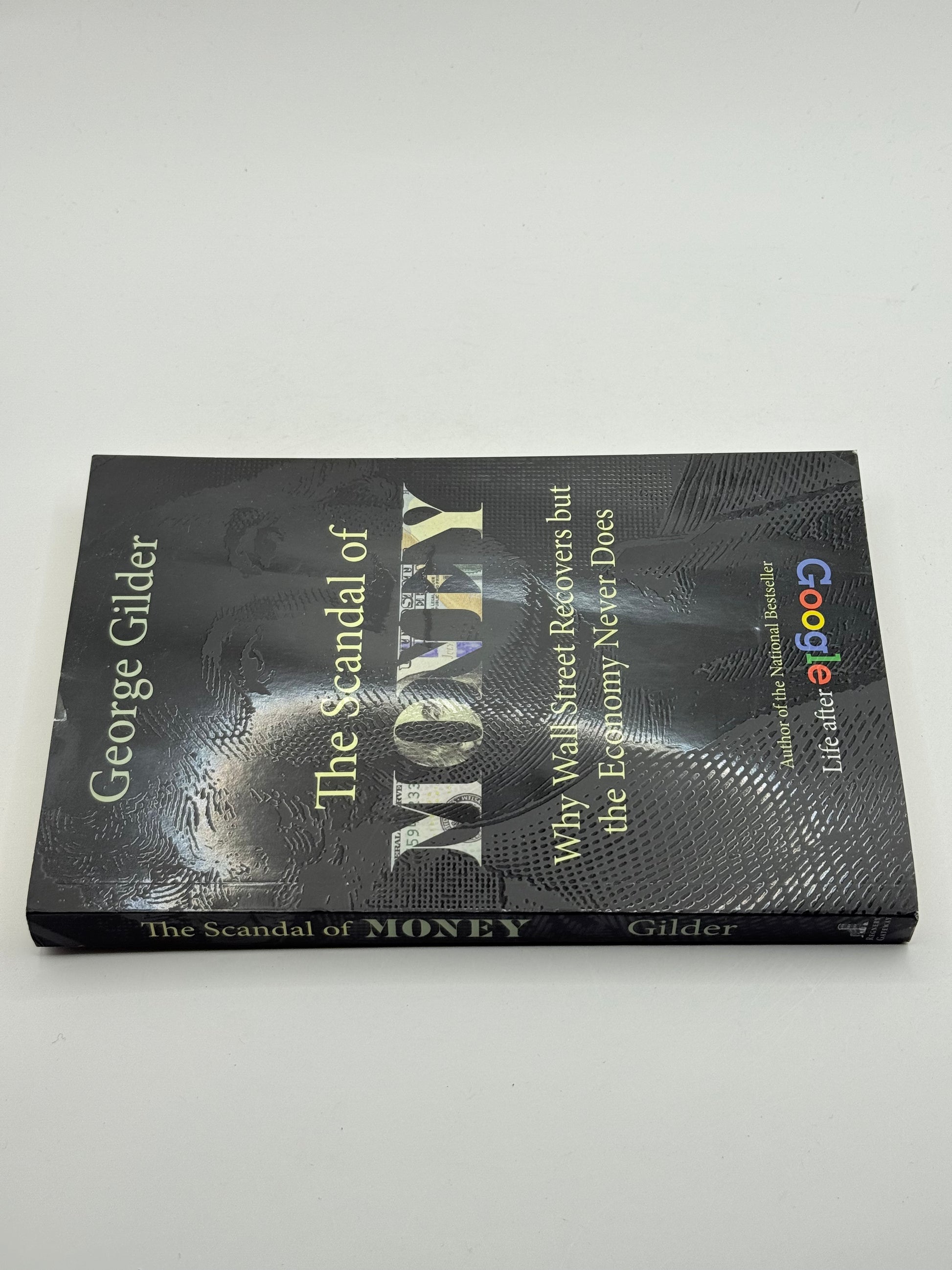 The scandal of money: why wall street recovers but the economy never does by george gilder - print books printed media