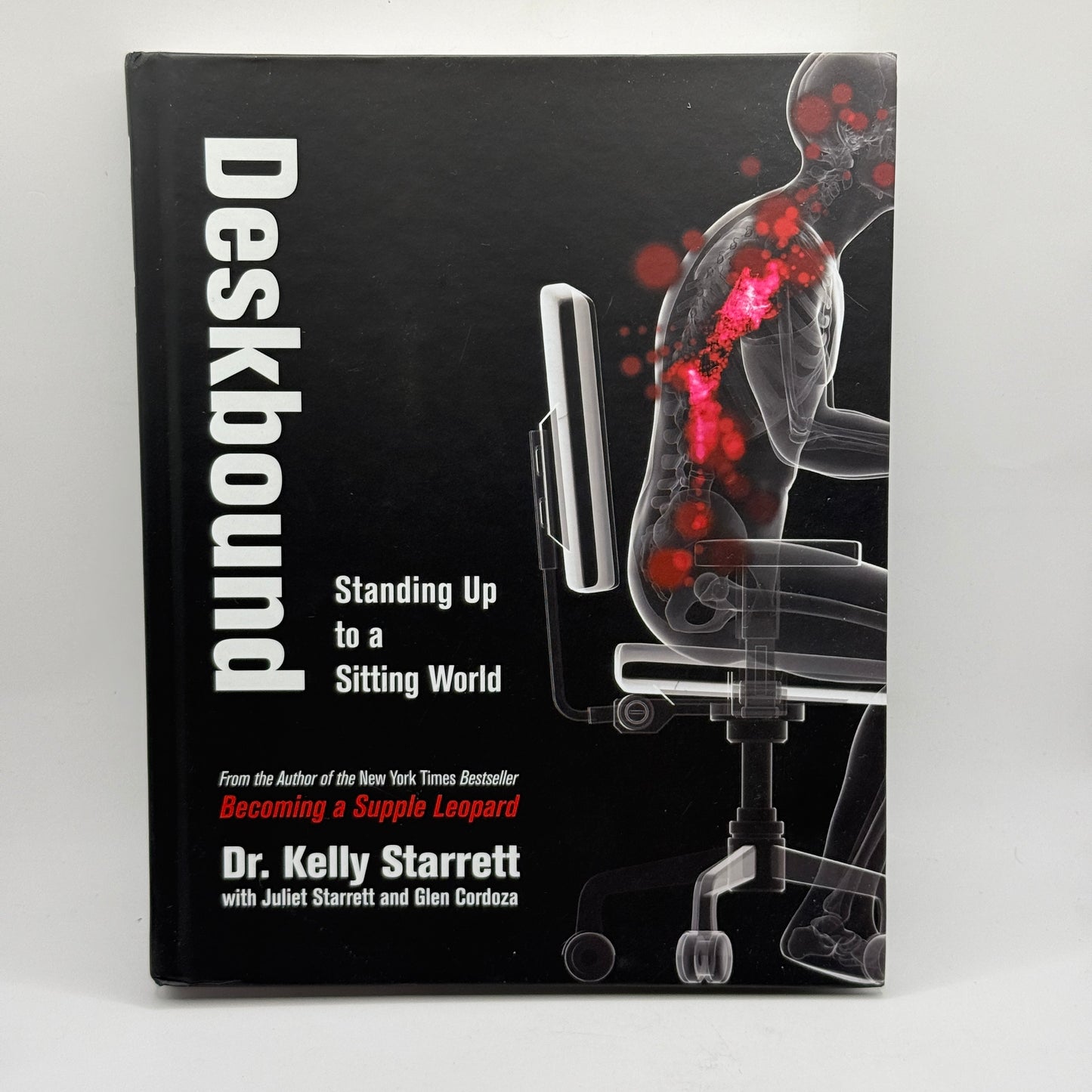 Deskbound: Standing Up to a Sitting World by Dr. Kelly Starrett