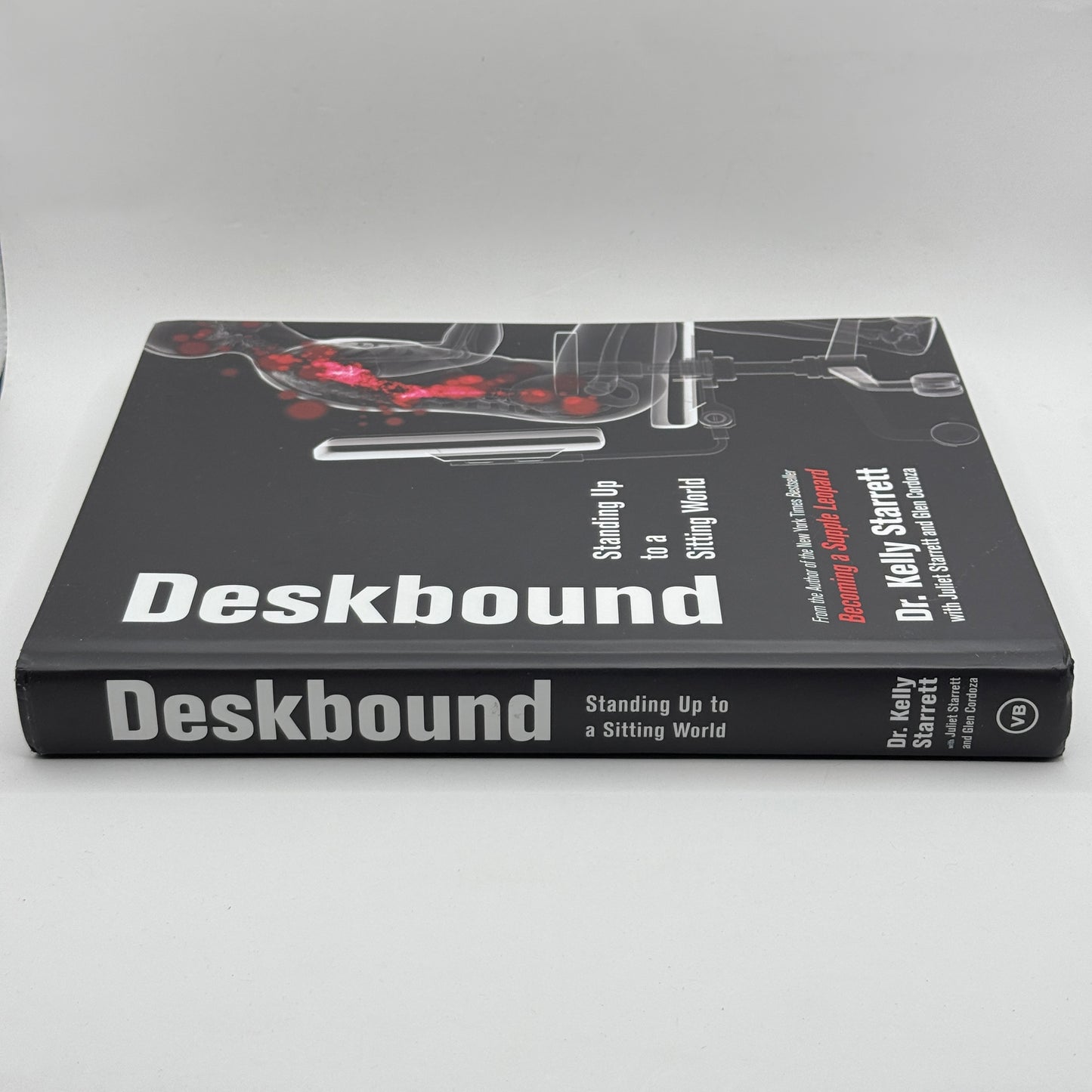 Deskbound: Standing Up to a Sitting World by Dr. Kelly Starrett