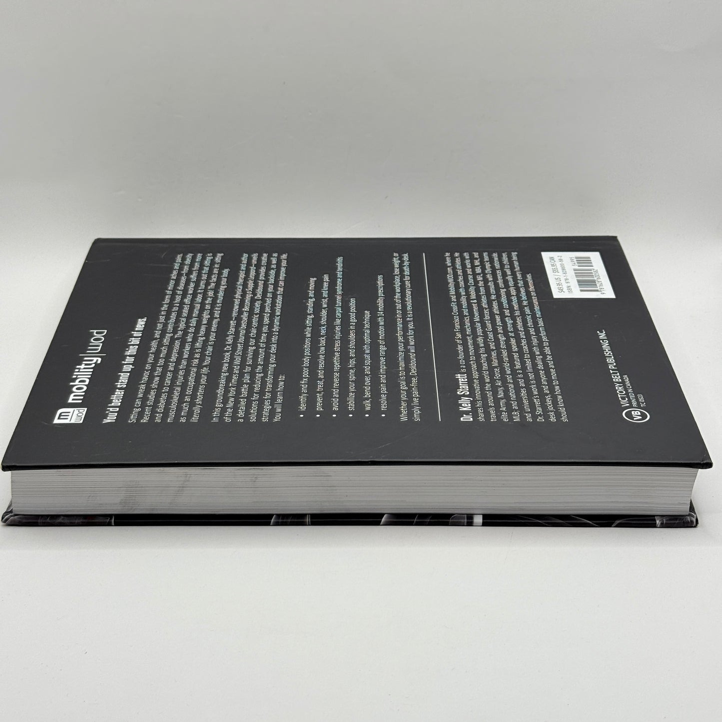 Deskbound: Standing Up to a Sitting World by Dr. Kelly Starrett