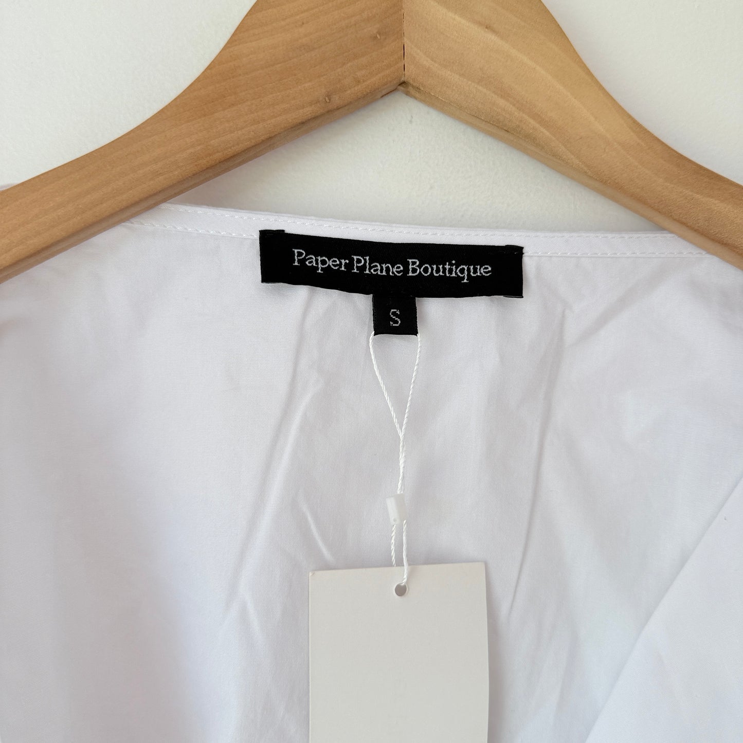 Paper Plane Boutique Statement Sleeve Wrap Top – Size S