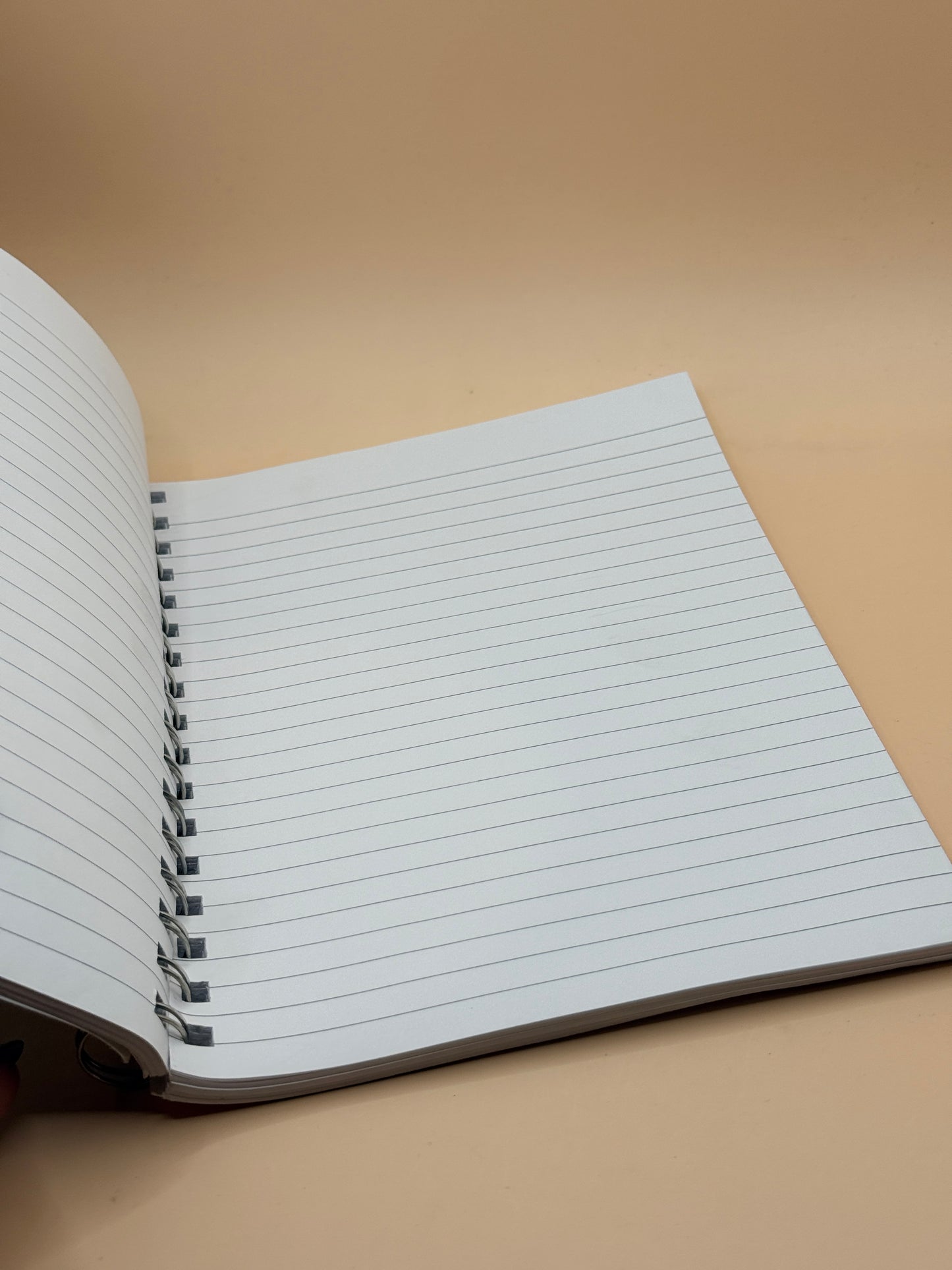 “R” Blue Spiral Notebook with Sports & Music Design
