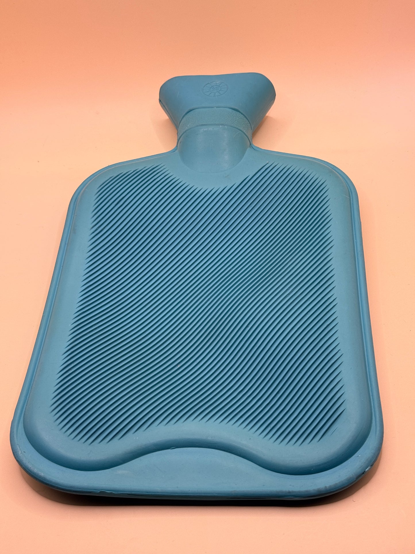 Blue rubber hot water bottle