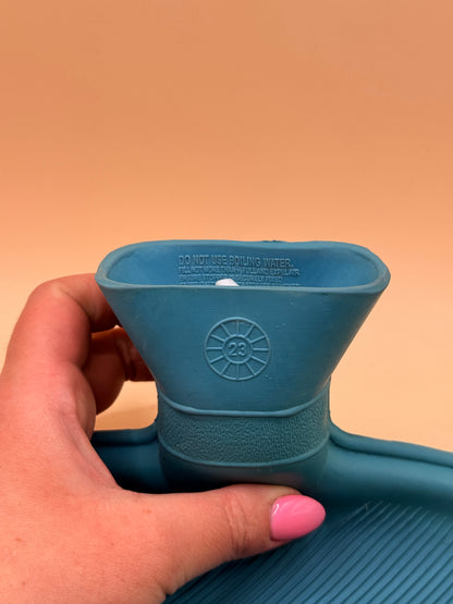 Blue rubber hot water bottle