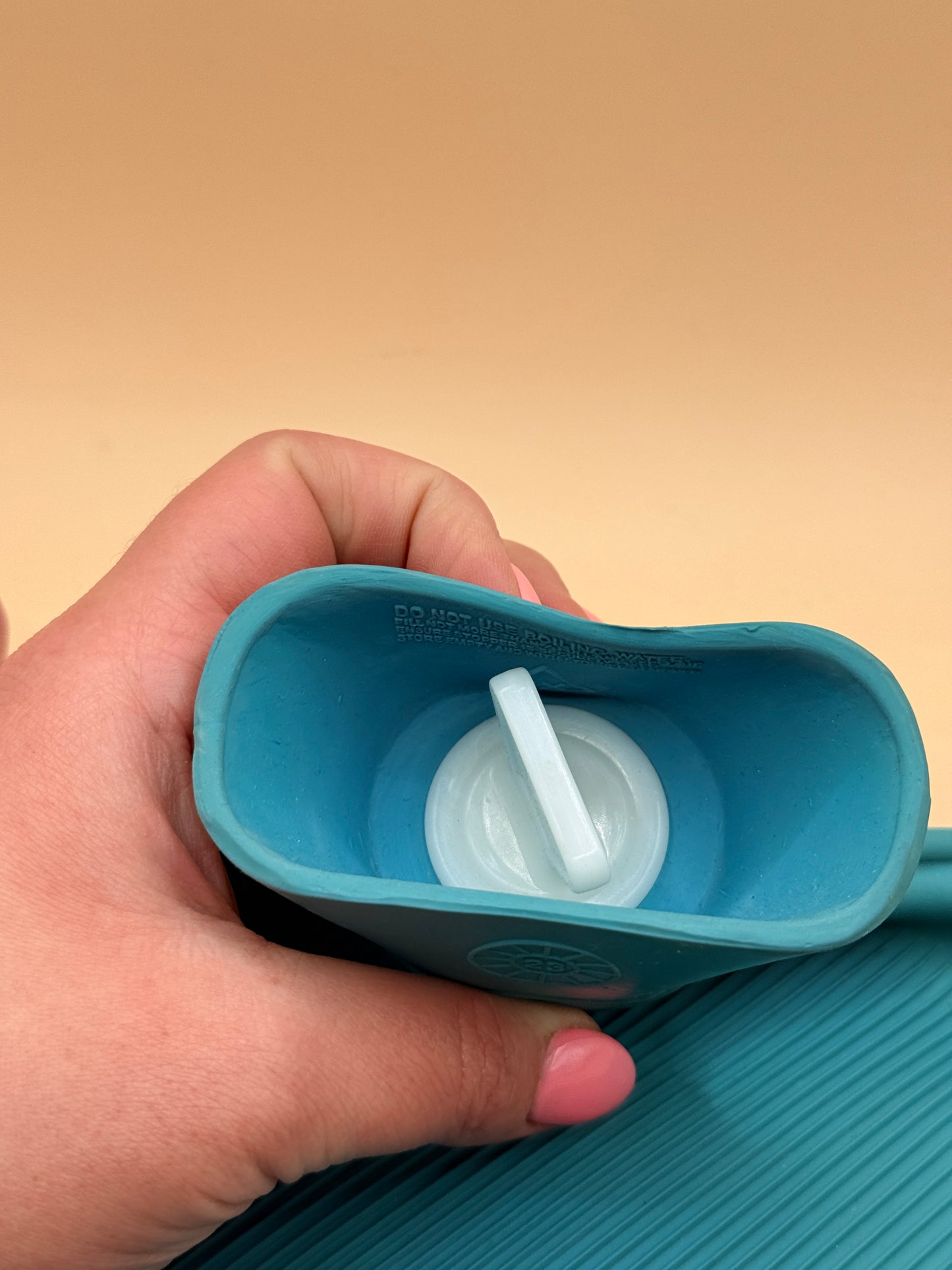 Blue rubber hot water bottle