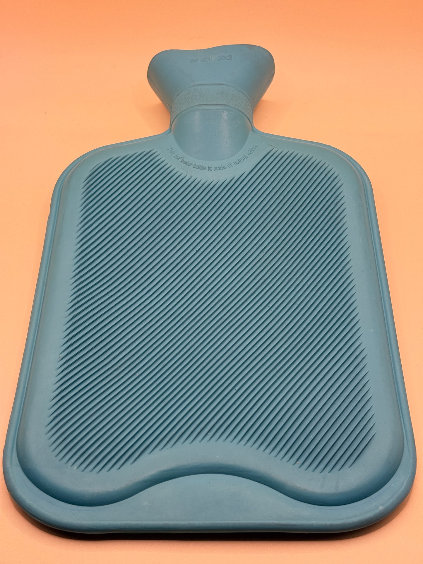 Blue rubber hot water bottle