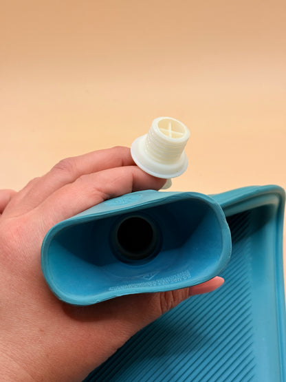 Blue rubber hot water bottle