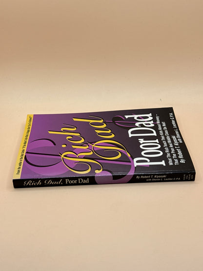 Rich Dad Poor Dad by Robert T. Kiyosaki & Sharon L. Lechter