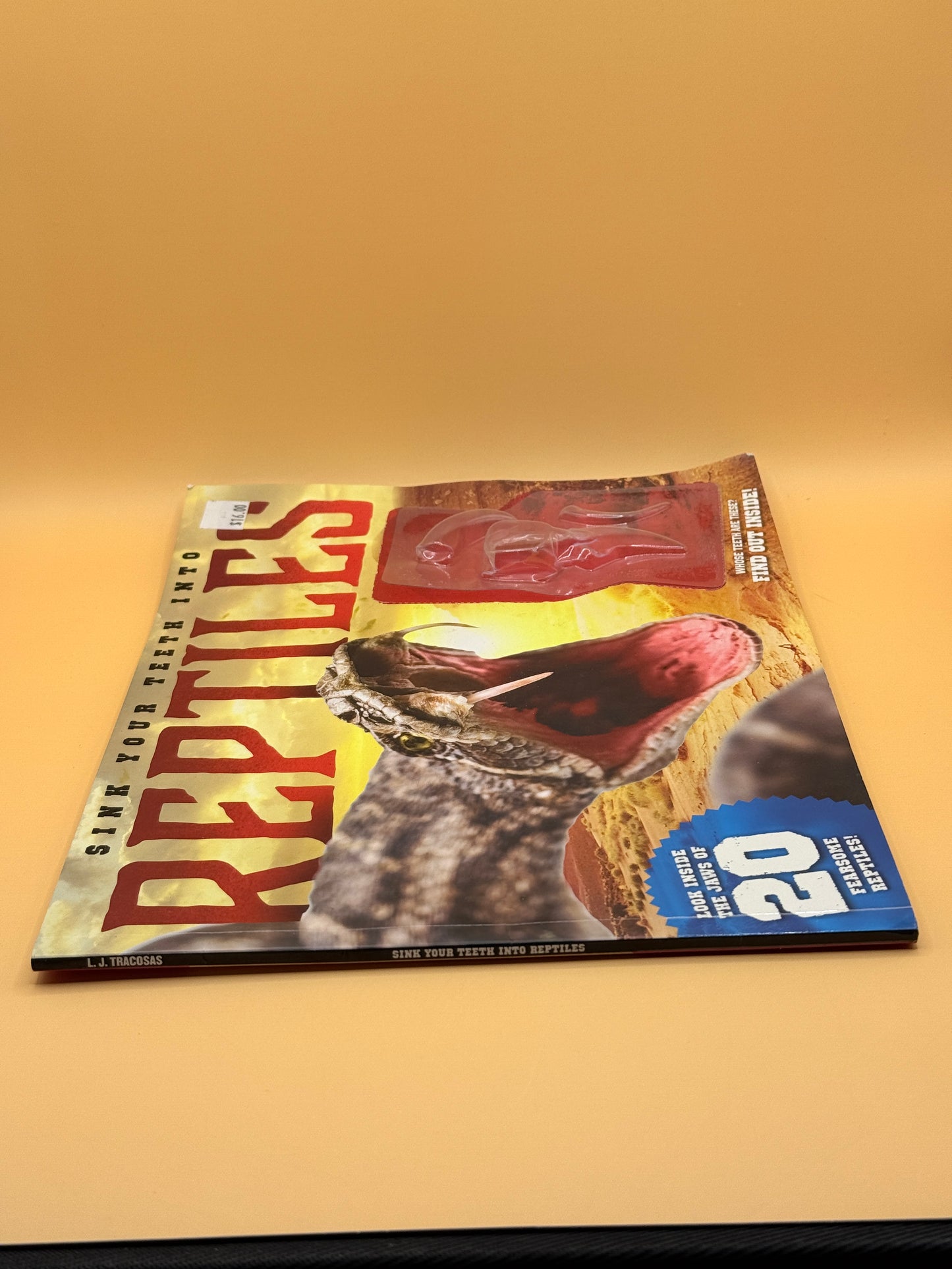 Sink Your Teeth Into Reptiles by L. J. Tracosas