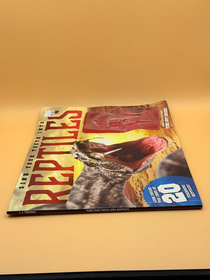 Sink Your Teeth Into Reptiles by L. J. Tracosas