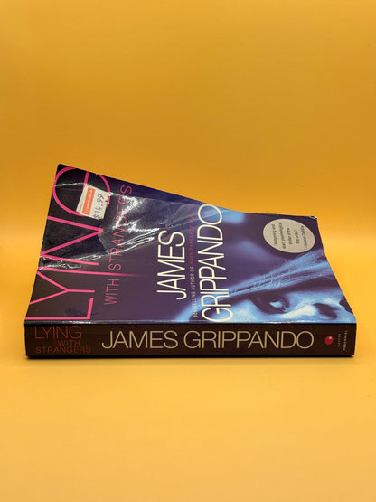 Lying with Strangers by James Grippando