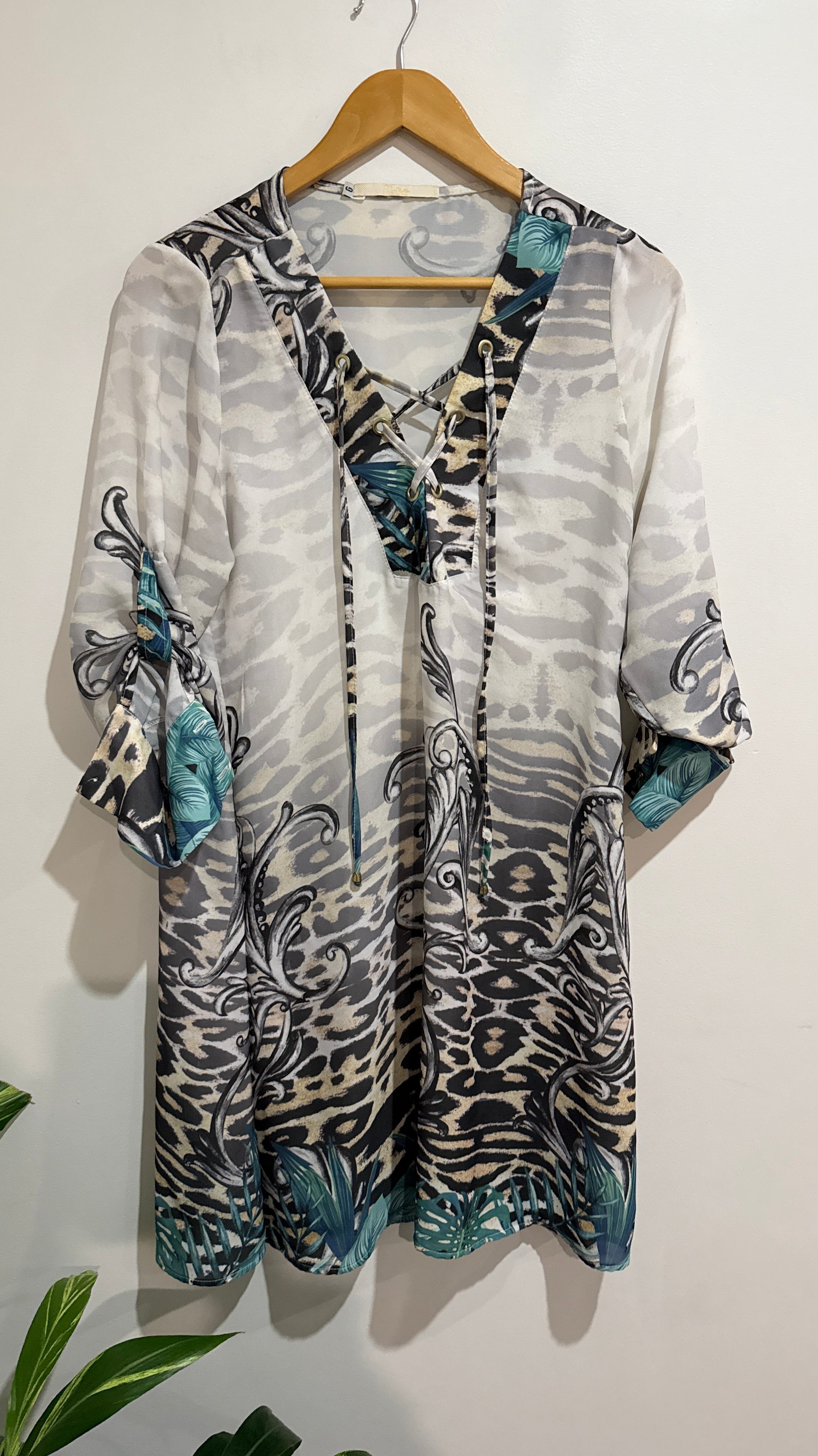 Metro Leopard Print Lace Up Tunic Top