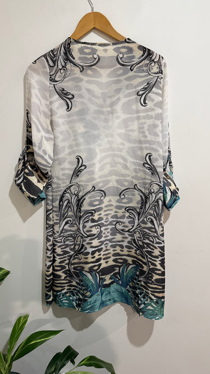 Metro Leopard Print Lace Up Tunic Top