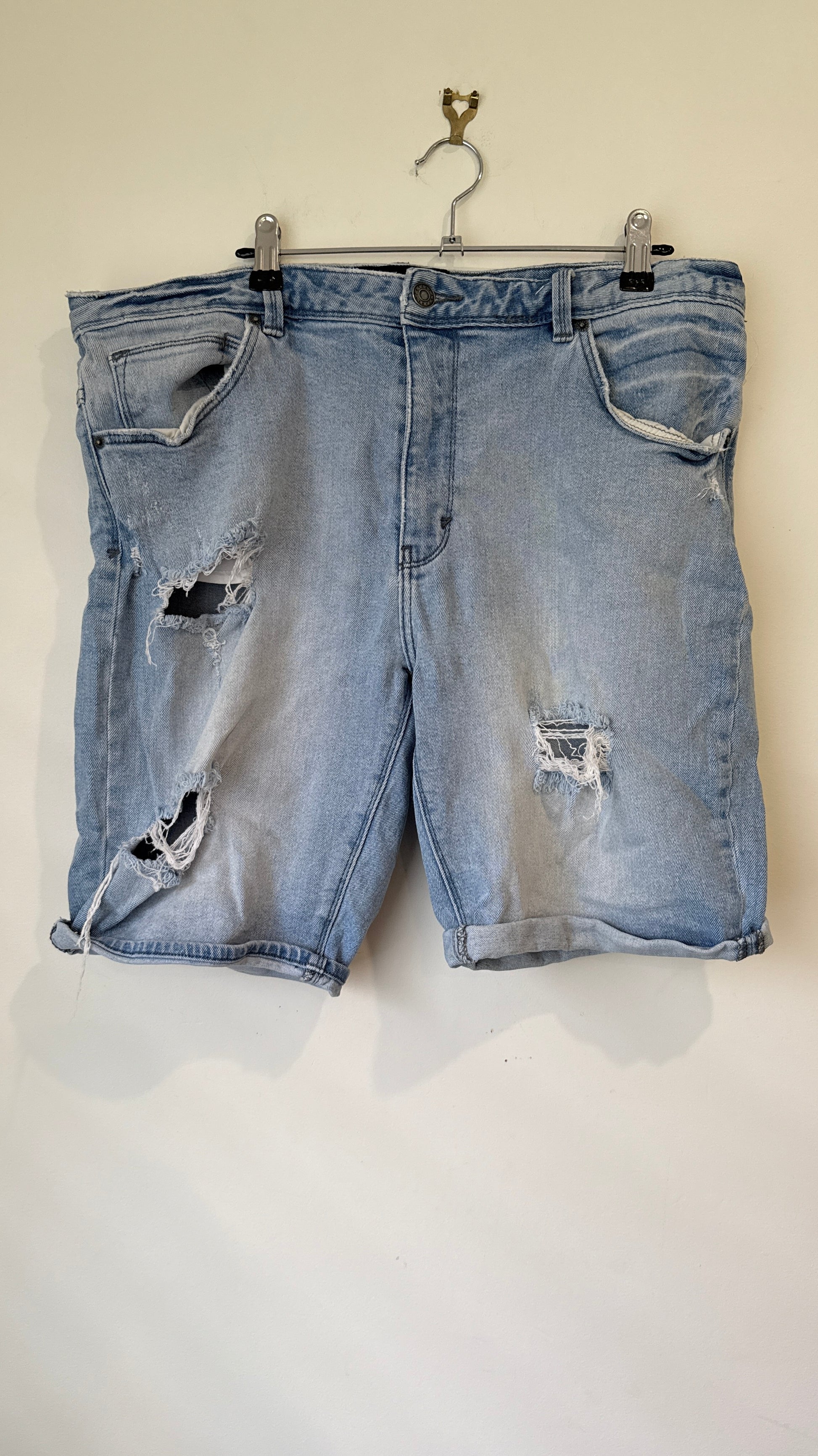 Abrand Size 36 Dropped Slim Light Wash Distressed Denim Shorts