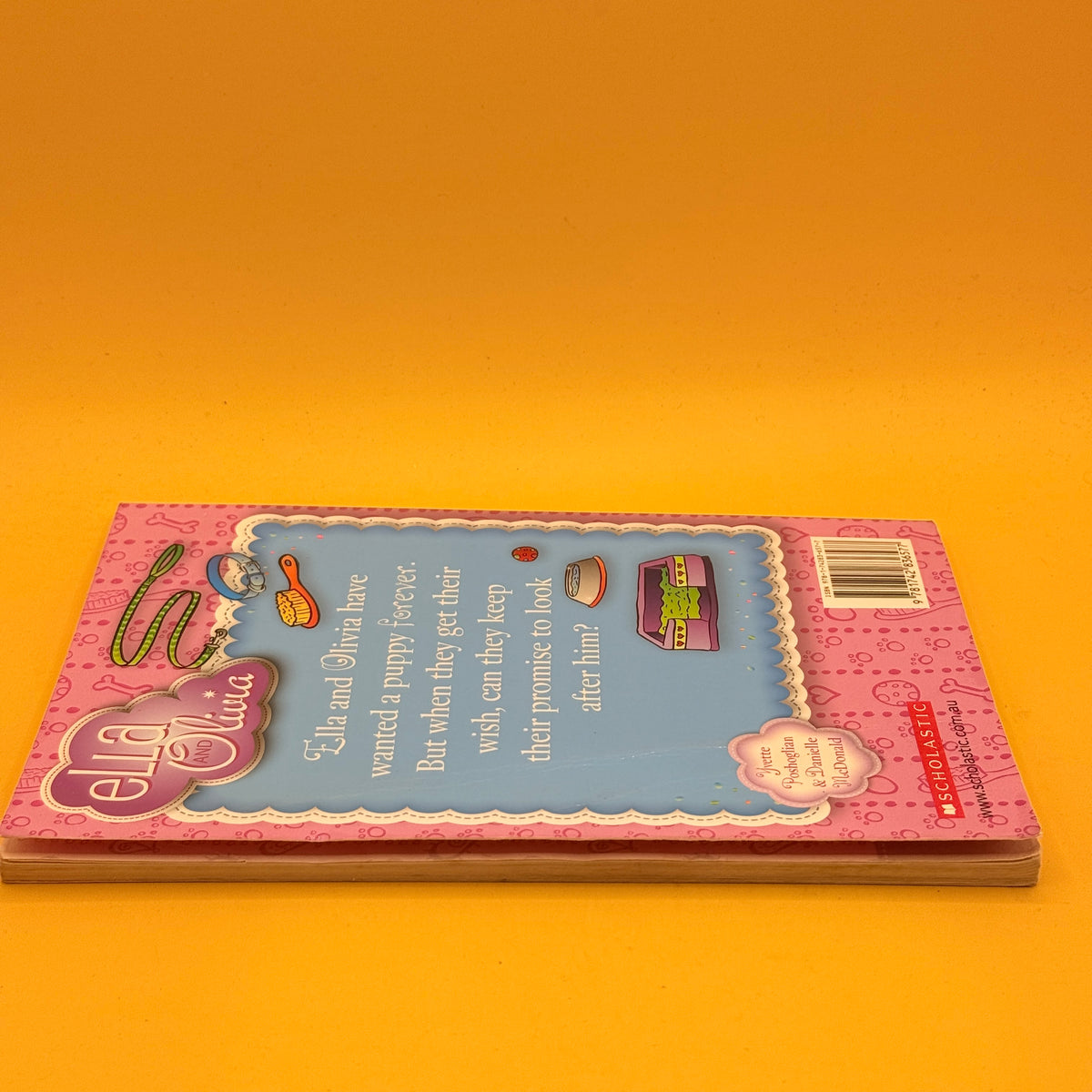 Ella and Olivia: Puppy Trouble by Yvette Poshoglian