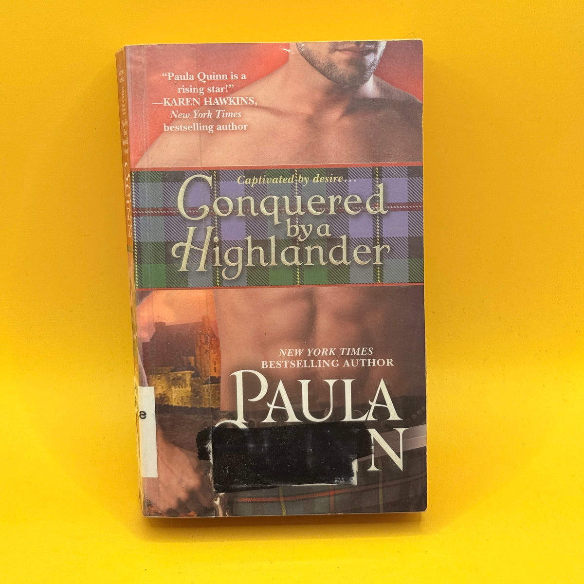 Conquered by a Highlander by Paula Quinn