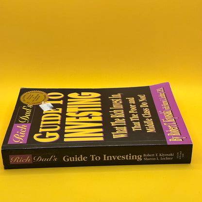 Rich Dad's Guide to Investing by Robert T. Kiyosaki and Sharon L. Lechter