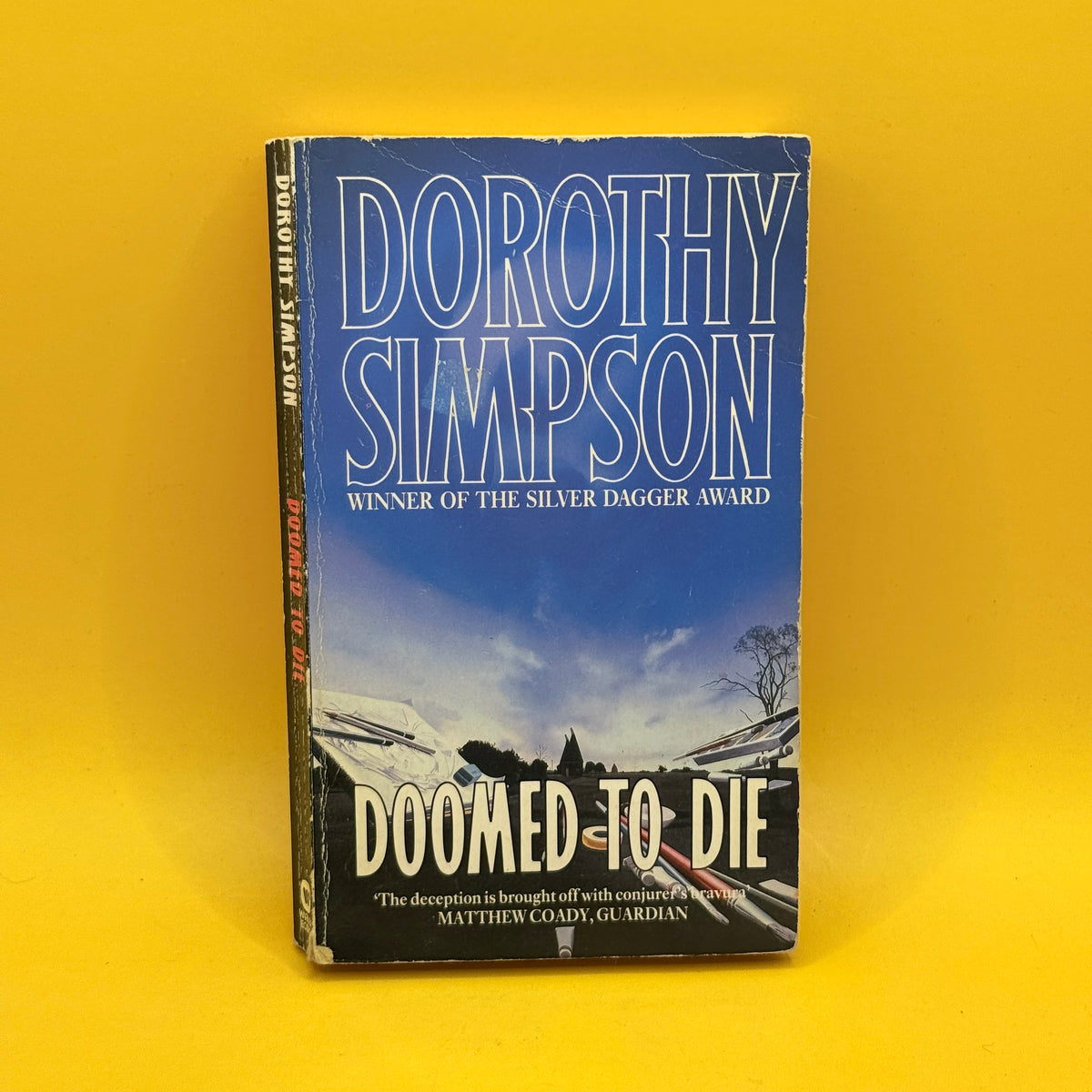 Doomed to Die by Dorothy Simpson