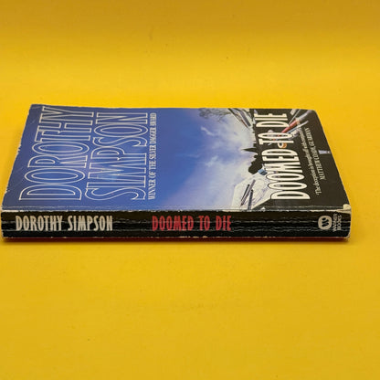 Doomed to Die by Dorothy Simpson