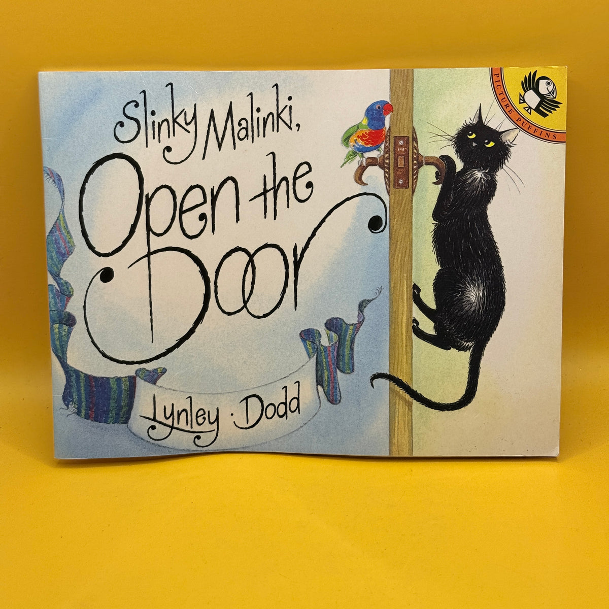 Slinky Malinki, Open the Door by Lynley Dodd