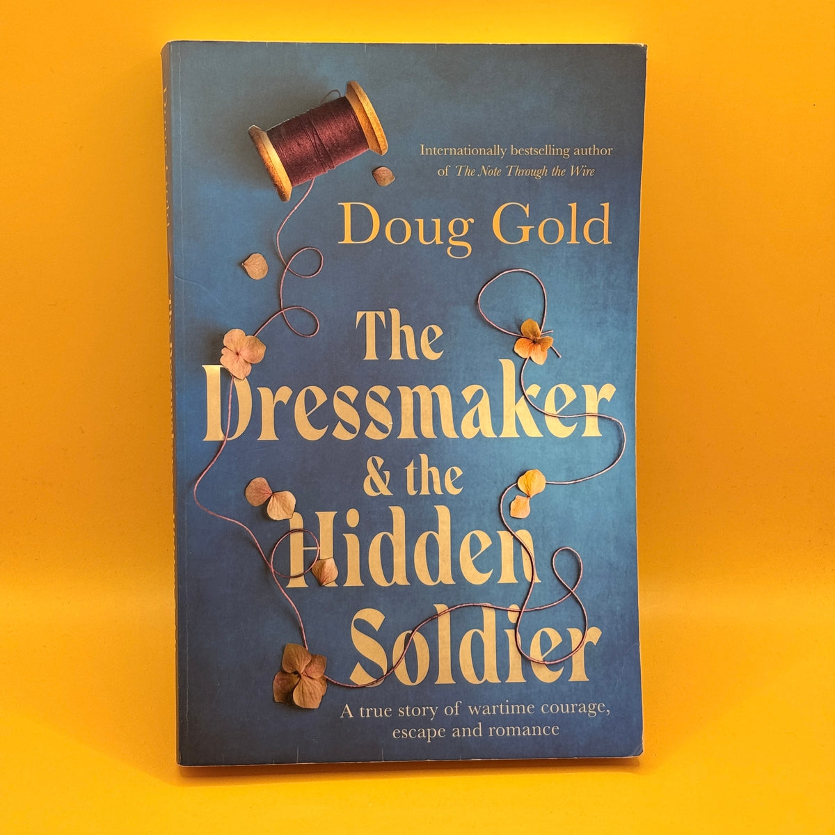 The Dressmaker & the Hidden Soldier by Doug Gold