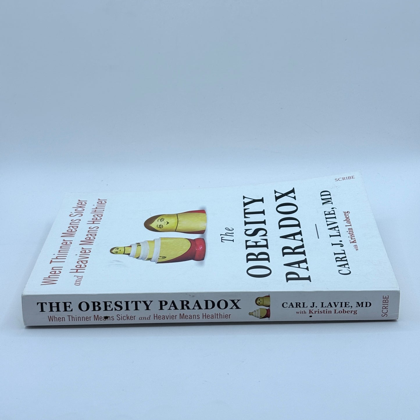 The Obesity Paradox by Carl J. Lavie, MD, with Kristin Loberg