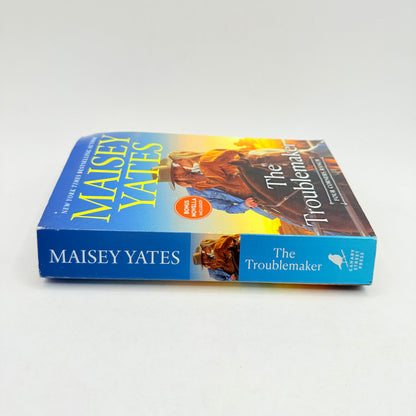 The troublemaker by maisey yates - print books condition: used - what’s new printed media