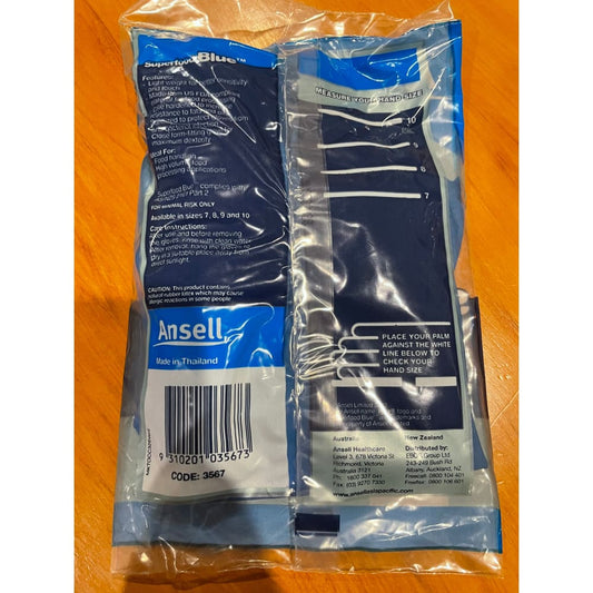 A packaged pair of blue Ansell Superfood Blue disposable gloves.
